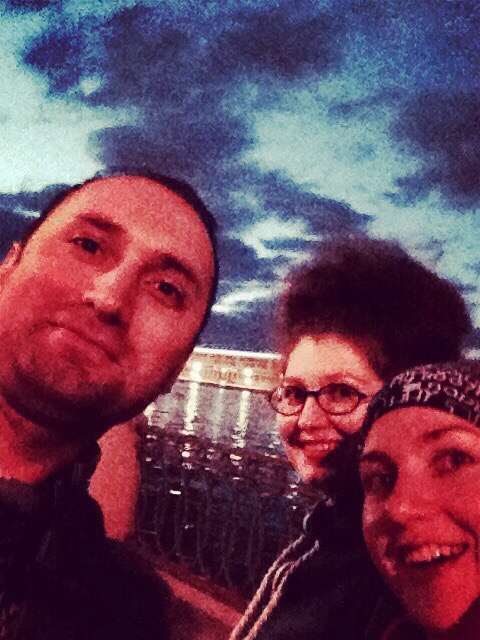 Selim Koç with friends by the water